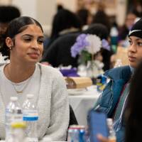 Girls of Color Summit previous event two students having a conversation